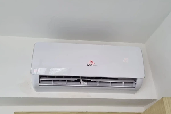 WSE Hybrid Thermal AC installed on HDB balcony ledge